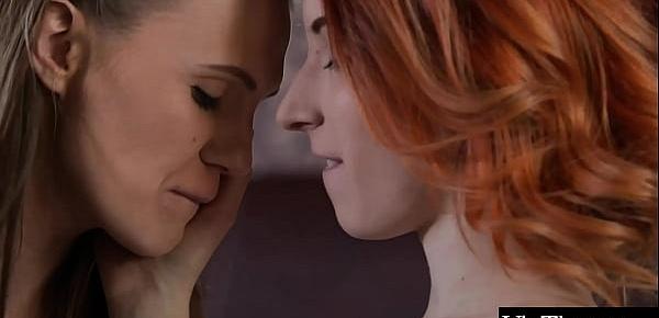  Stunning redhead catches gorgeous brunette Elina De Lion in the shower